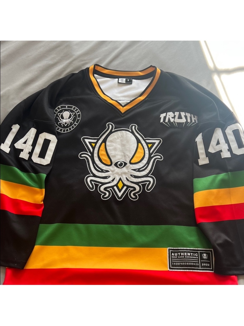 Truth Black Octopus Stripe Hockey Jersey - Black/Green/Yellow/Red